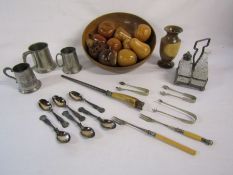 Wooden fruit bowl with wooden fruit and a collection of silver plate items to include sugar tongs