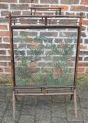Bamboo framed fire screen with dried ferns & other flora between two glass panels