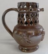 19th century salt glazed stoneware puzzle jug with 3 nozzles & pierced collar, sprigged with two