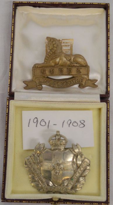 Lincolnshire Imperial Yeomanry cap badge & a Lincolnshire Regiment WWI plastic cap badge