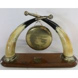 Late Victorian / Edwardian cow horn dinner gong on oak stand & decorative letter rack with fret