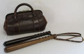 Brown leather Gladstone bag & 2 truncheons