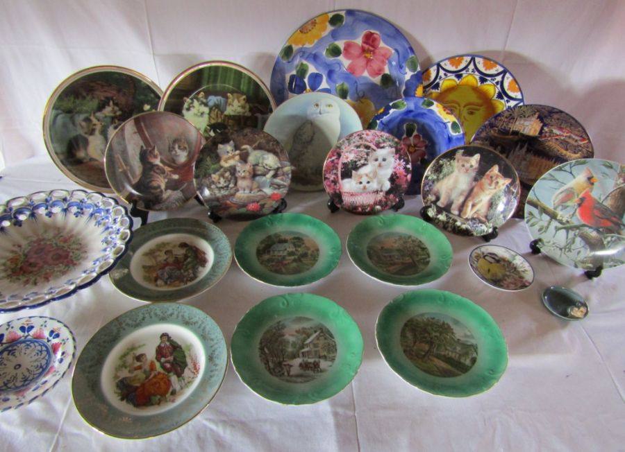 A selection of display plates to include cat and bird collector plates among others