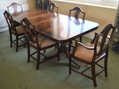 Good quality reproduction Regency style twin pedestal dining table with sabre legs in flame mahogany