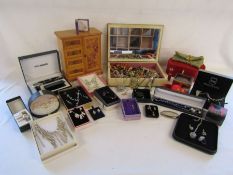 A selection of jewellery boxes and boxed and loose costume jewellery