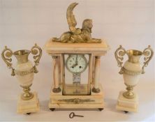 French marble clock garniture in the Empire style with Sphynx pediment
