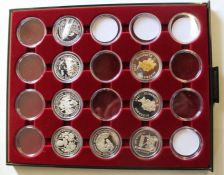 8 Queen Elizabeth II Alderney proof crowns in collectors tray with additional coin cases