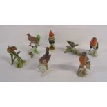 A collection of Goebel ornaments to include Wren, Mourning Cloak butterfly, Robin and chaffinch also