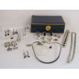 A collection of silver items to include a pair of masonic cuff links, rings, earrings and chains etc