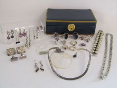 A collection of silver items to include a pair of masonic cuff links, rings, earrings and chains etc