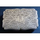 Victorian shaped silver table snuff box with elaborate engraved decoration on all sides, the central