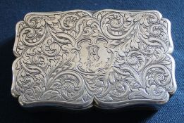 Victorian shaped silver table snuff box with elaborate engraved decoration on all sides, the central