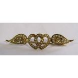 14ct gold & seed pearl brooch with winged intertwined hearts (some pearls missing) total weight 3.