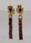 18ct gold earrings with rubies (stamped to butterfly and tested to confirm) total weight 4.3g