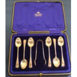 Cased set of 6 silver teaspoons & pair of sugar nips with bright cut engraving Sheffield 1904 3.