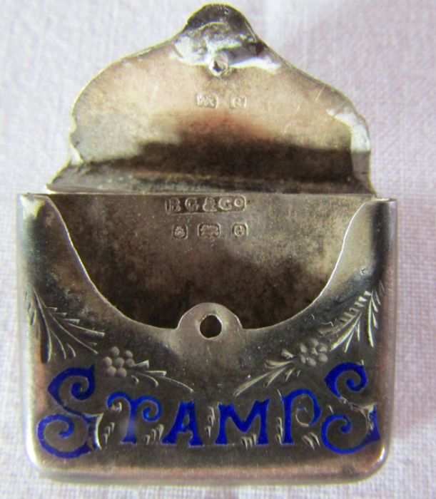 A collection of silver and white metal items, to include a silver photo frame, silver stamp - Image 5 of 10