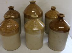 6 Lincolnshire stoneware flagons- Melbourn Bros Stamford Grantham Lincoln, Horry & Son Boston, F