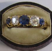 18ct gold 3 stone sapphire (1/2ct) and 2 stone diamond (1/2ct) ring with case - total weight 3.