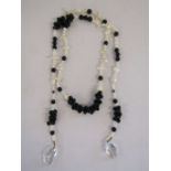 Fresh water pearl wrap necklace with quartz drops and possibly onyx beads, silver stamped cuffs