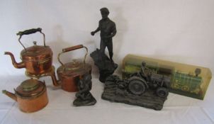 3 copper kettles with a brass stand, a tractor ornament etc