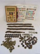 A large collection of old pennies, three pences and other coins - A stamp collectors book with