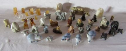 A mixed collection to include Wade whimsies and other miniature animals mainly elephants