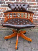 Brown leather Captains chair