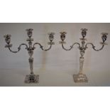 Pair of silver two branch candelabra with neo-classical decoration maker Barker Ellis Silver Co.