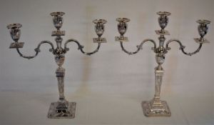 Pair of silver two branch candelabra with neo-classical decoration maker Barker Ellis Silver Co.