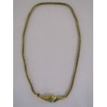 Tested as 15ct gold 20" snake necklace - head set with turquoise and garnet - may need some new