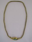 Tested as 15ct gold 20" snake necklace - head set with turquoise and garnet - may need some new