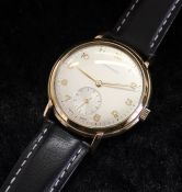 9ct gold Longines 17 jewels wristwatch with new black leather strap, numbered 8086672, 37mm dia inc.