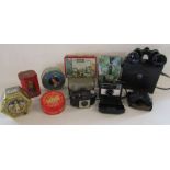 A collection of vintage tins, Kodak instamatic, Kodak Brownie and Tarka and Ultraview binoculars