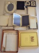 2 silver hallmarked miniature photo frames, several white metal photo frames (some stamped Sterling)