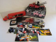 Texaco 1960 Mack-B model tow truck, a Coca-Cola truck, 2 vintage car badges and some photographs