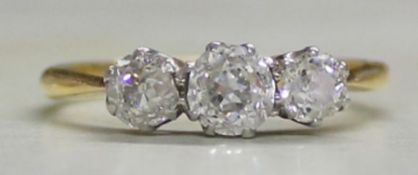 18ct gold 3 stone diamond ring approximately 1 ct in total (0.25 + 0.50 + 0.25) size N 2.5g