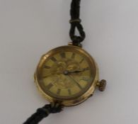 18k Continental fob watch made into wristwatch with leather strap (not working)