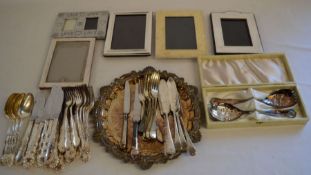 Silver plated cutlery, a salver, photo frames etc