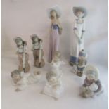 Collection of Nao and Lladro figures to include angels and eskimos