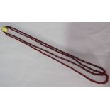 Twin strand ruby necklace with 18ct gold clasp