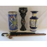 Umbrella stand (slight damage to rim) 2 walking sticks (one with duck brass handle) and umbrella,