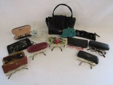 Collection of eye glasses and sunglasses, a ladies handbag purse and gloves etc