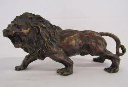 Heavy bronze lion approx. 30cm x 14cm