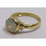 18kt also stamped 750 gold and opal ring total weight 3.7g ring size N/O