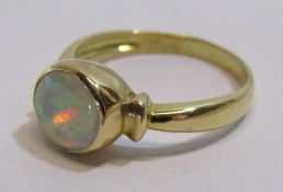 18kt also stamped 750 gold and opal ring total weight 3.7g ring size N/O