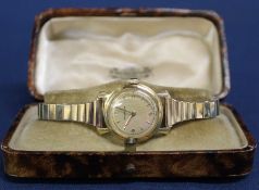 18k / 750 Jaeger-Le-Coulture ladies wristwatch on expanding strap, the back marked 579960 -