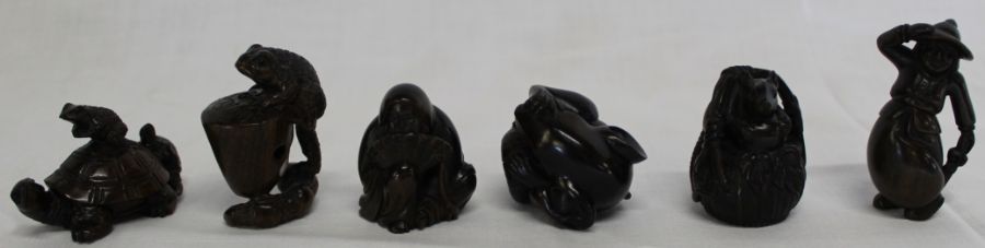 6 Japanese hardwood signed netsuke: - rat, rat in basket (missing an eye), man with hat, seated
