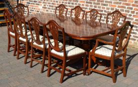 Regency style mahogany dining table on twin pedestals with removable leaf extending to 230cm by