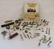 Small collection of items to include fishing hooks, brass peg, coins small figures etc