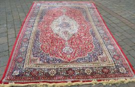 Persian red ground carpet 304cm by 197cm